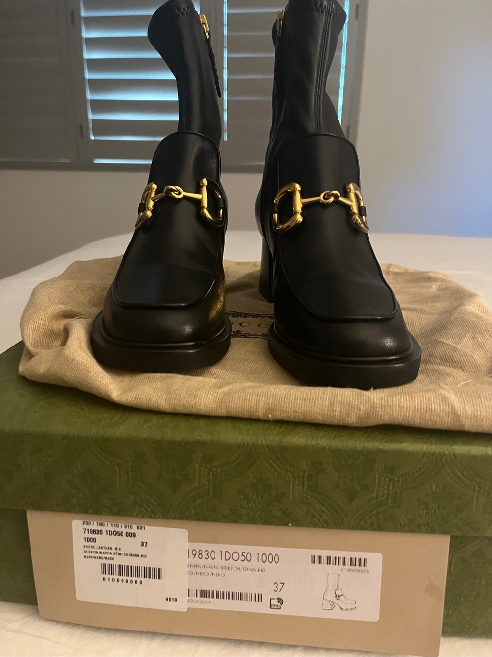 Gucci Black Leather Ankle Boots with Gold Horsebit